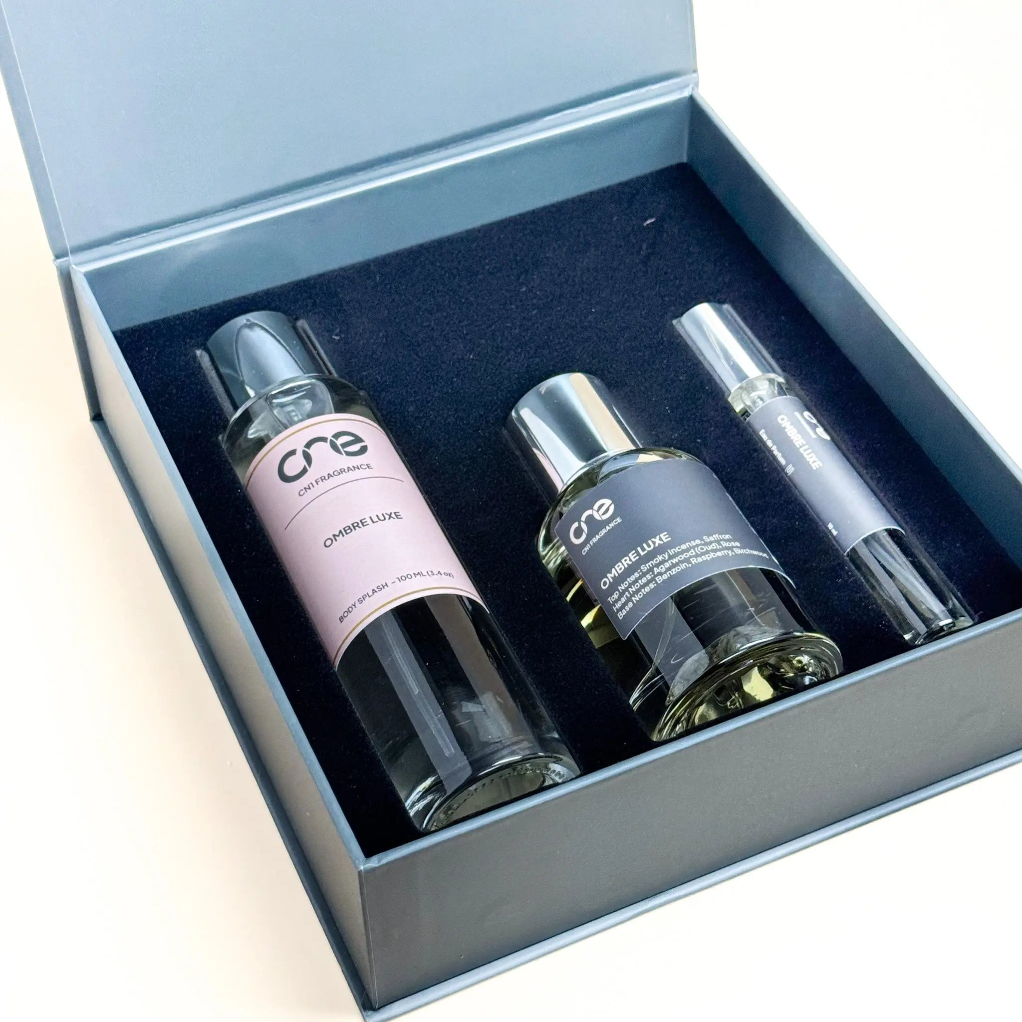 Three bottles of 'one' brand products in a box